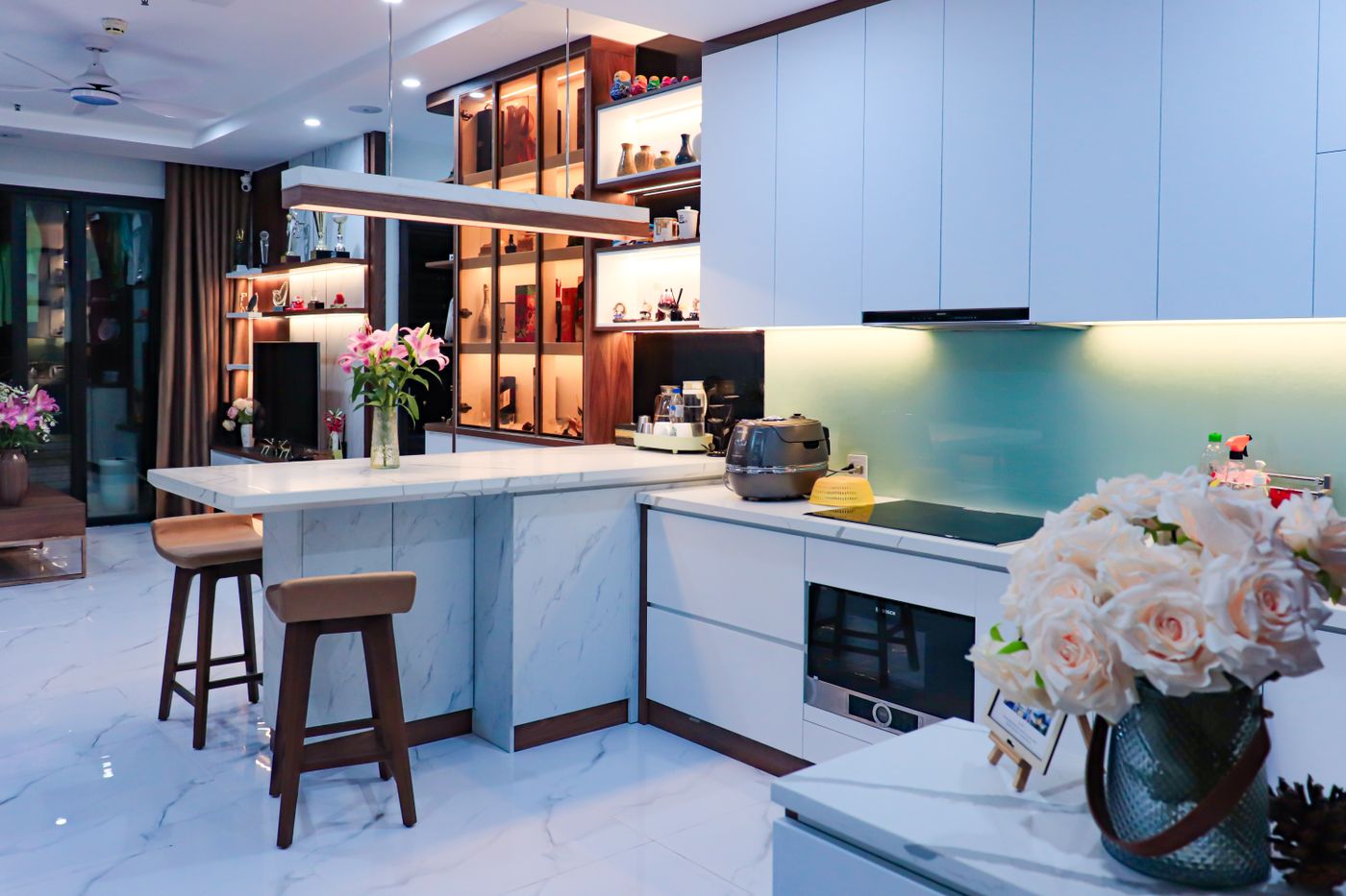 Bright, beautifully arranged kitchen with clean white surfaces